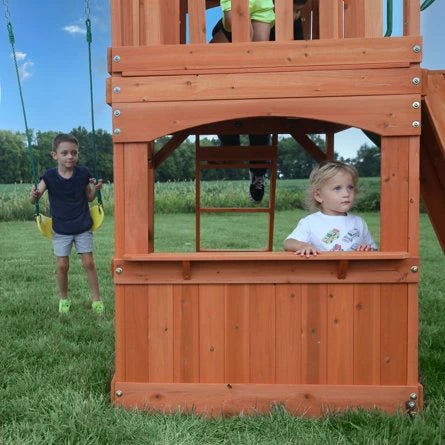 Backyard Discovery Atlantis Cedar Wood Swing Set with Wave Slide, Clubhouse, Rock Wall, and Sandbox Area - Image 9